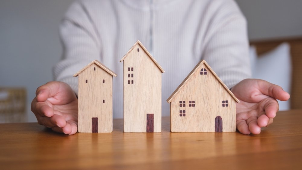 closeup,image,of,a,woman,holding,and,showing,a,wooden